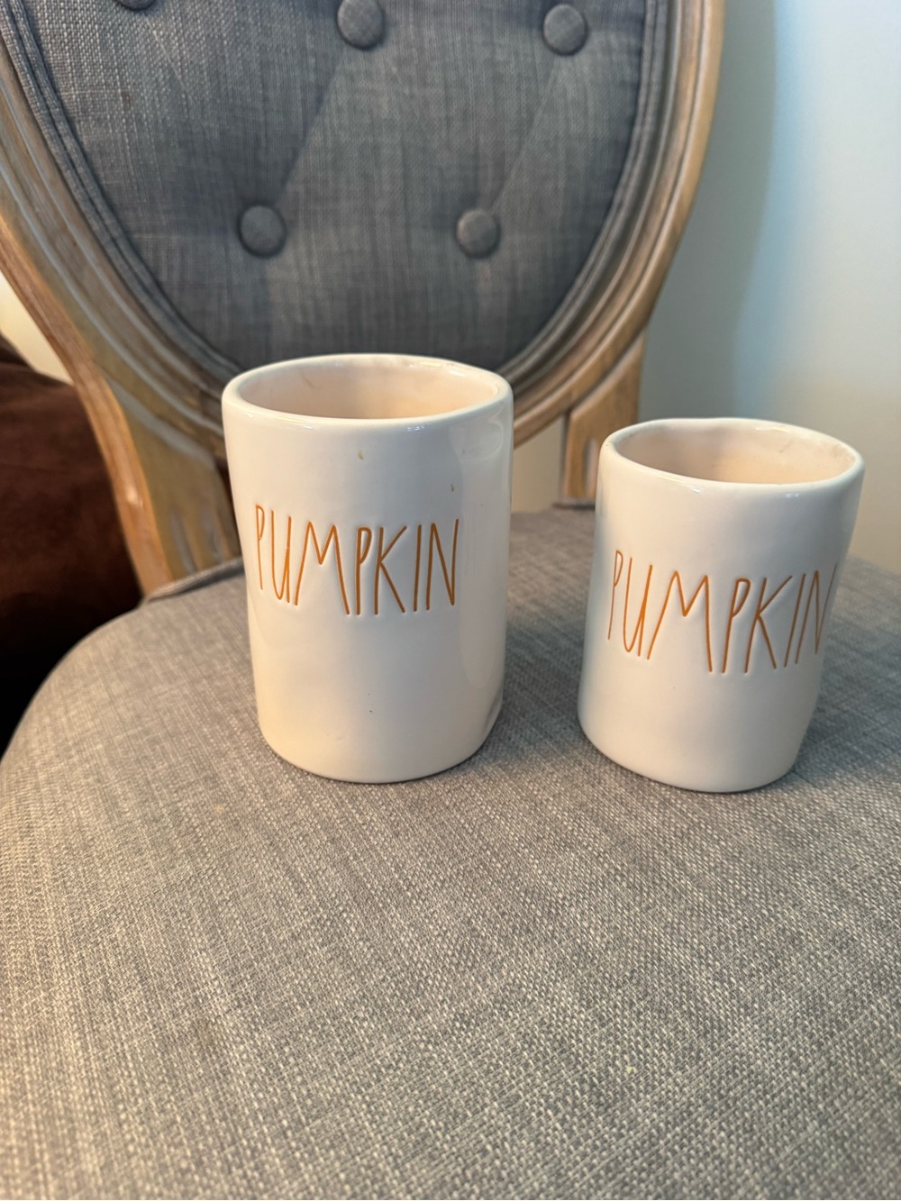 Set of 2 Rae dunn Ceramic 'Pumpkin' candles with lots of life left